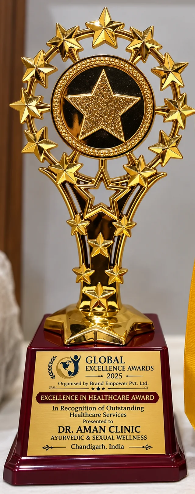 Global Excellence Awards 2025 trophy, Excellence in Healthcare Award presented to Dr. Aman Clinic, Ayurvedic and Sexual Wellness, Chandigarh